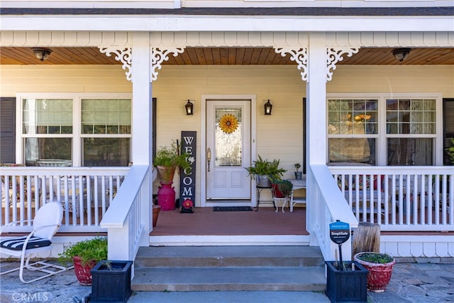 doorway to property with a porch