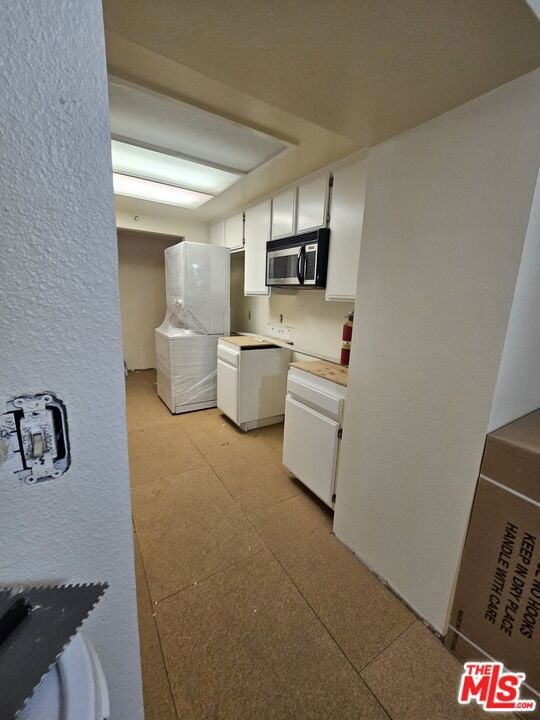 kitchen with white cabinetry