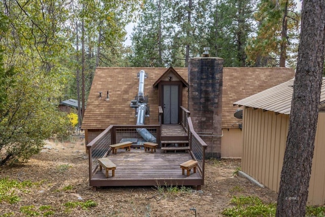 rear view of property with a deck