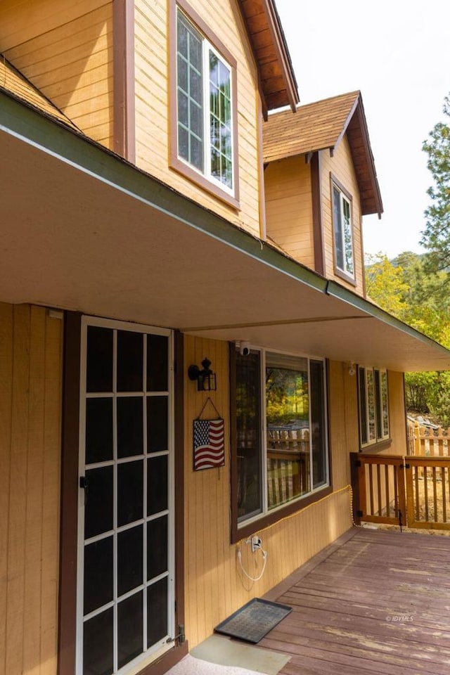 exterior space featuring a wooden deck