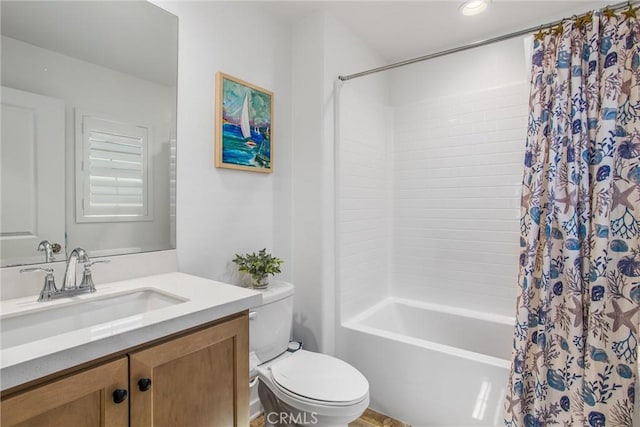 full bathroom featuring vanity, toilet, and shower / bathtub combination with curtain