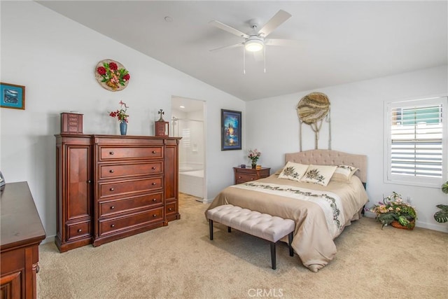 bedroom with ensuite bathroom, ceiling fan, lofted ceiling, and light carpet