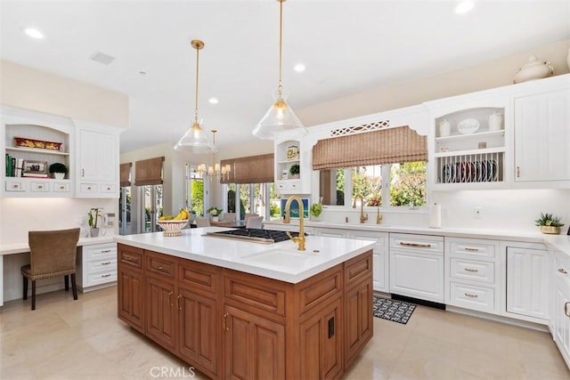 kitchen featuring stainless steel appliances, light countertops, white cabinetry, and open shelves