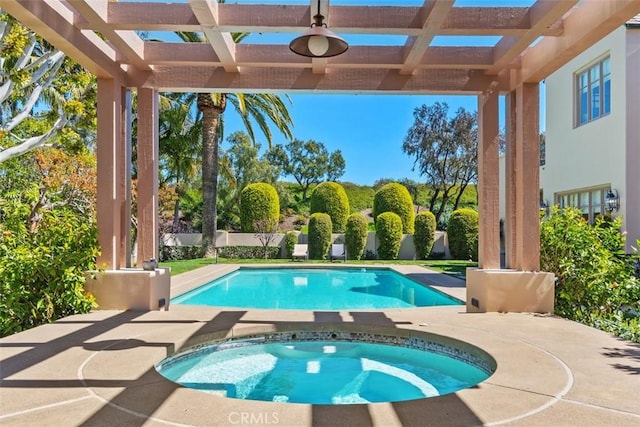 view of swimming pool featuring an in ground hot tub, a patio, and a pergola