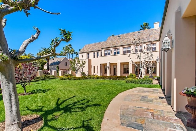 view of yard with a patio area