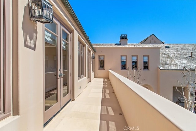 balcony featuring french doors