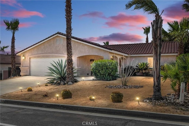 view of front of home with a garage