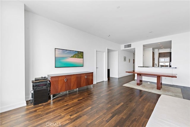 living room with dark wood-type flooring