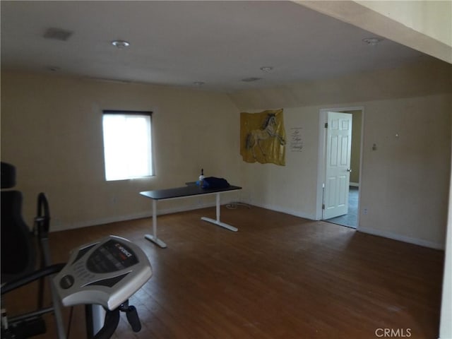 exercise area featuring wood-type flooring