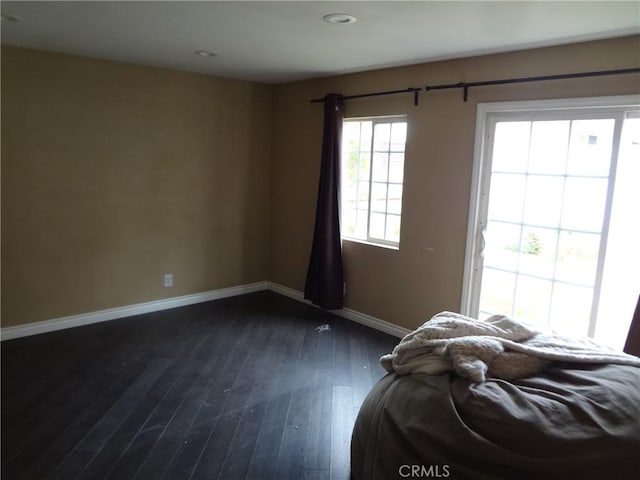 interior space with dark hardwood / wood-style floors