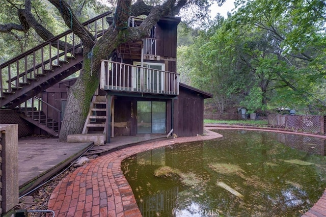 rear view of property featuring a patio area