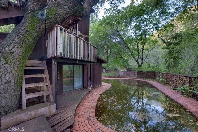 view of yard with stairway and fence