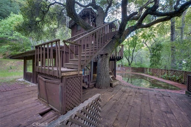 deck featuring stairs