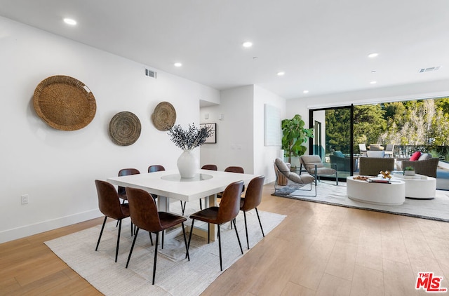 dining room featuring light wood-type flooring