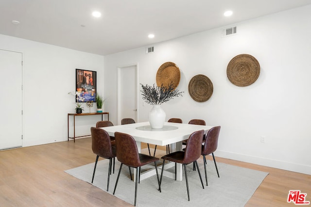 dining room featuring light hardwood / wood-style flooring