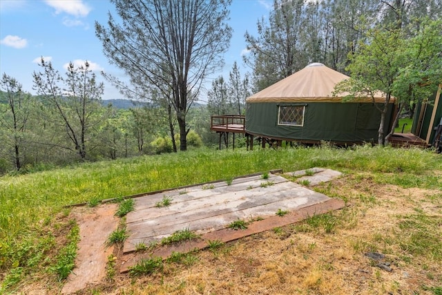 view of yard featuring a deck