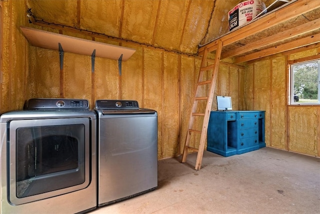 clothes washing area featuring washing machine and clothes dryer