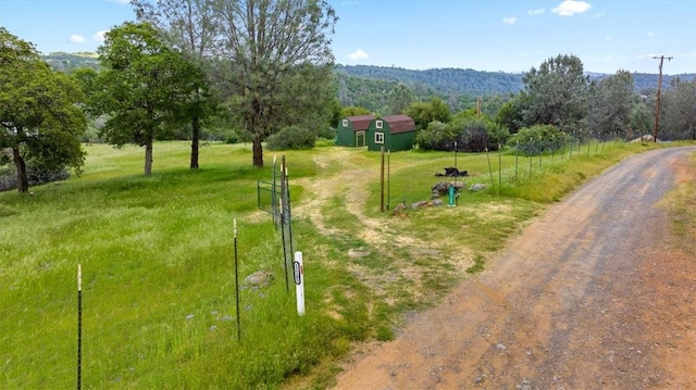 view of road with a rural view