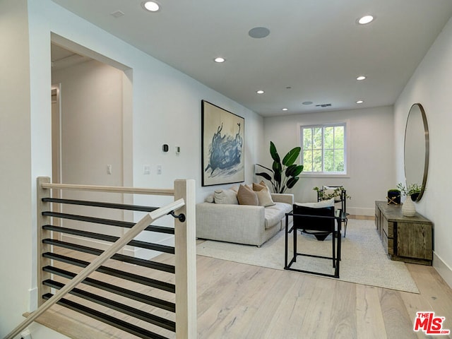 living room with light hardwood / wood-style floors