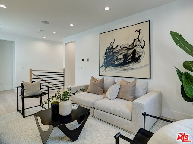 living room with light hardwood / wood-style floors