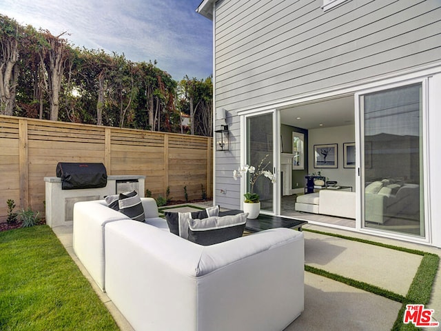 view of terrace with an outdoor living space