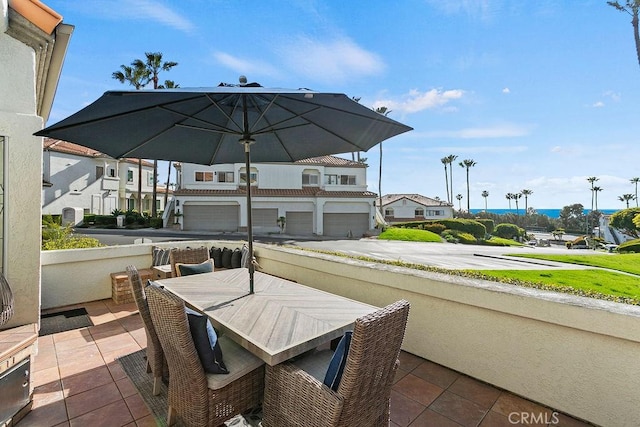 view of patio / terrace featuring a garage