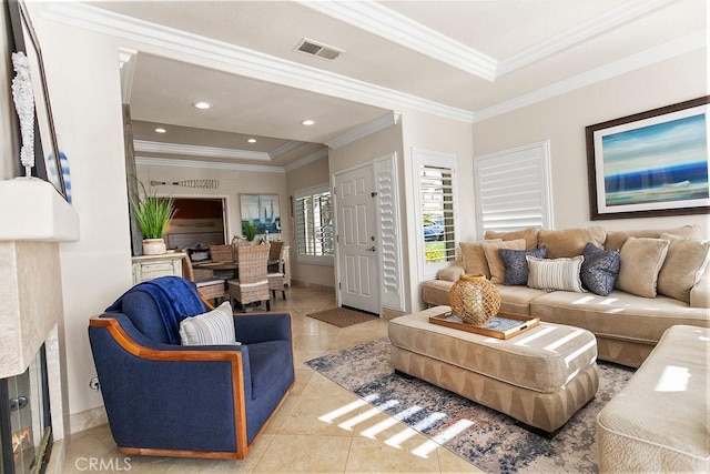 living room featuring tile patterned flooring and ornamental molding