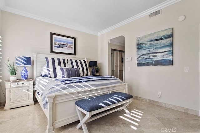 bedroom with crown molding