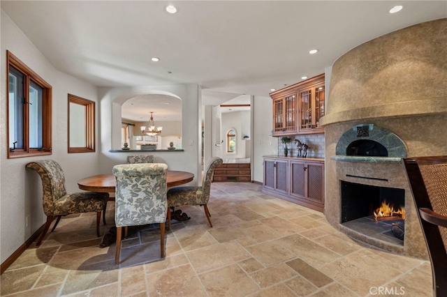 dining area with an inviting chandelier