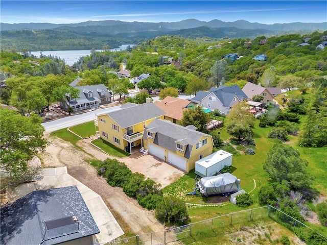 bird's eye view featuring a water and mountain view