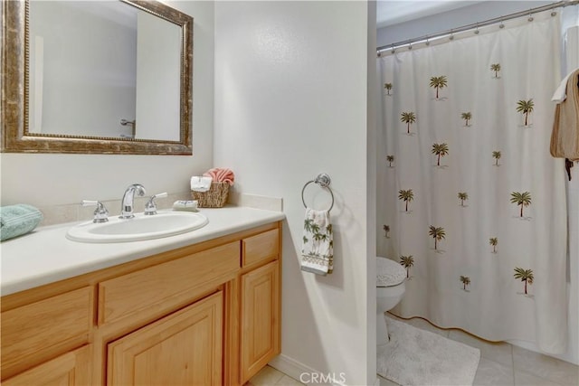 bathroom featuring tile patterned flooring, vanity, and a shower with shower curtain