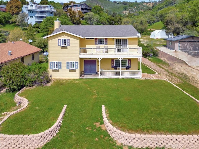 back of house with a porch