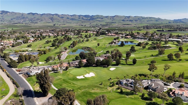 bird's eye view featuring a water and mountain view