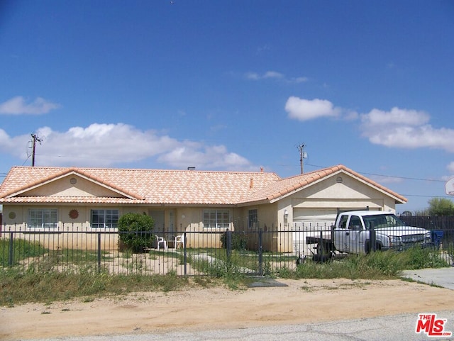 view of front of property featuring a garage