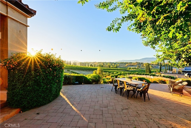 view of terrace with a mountain view