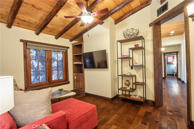 living room featuring wood ceiling, ceiling fan, and a wealth of natural light