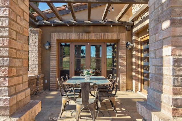 view of terrace with a pergola