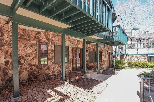 39802 Lakeview Dr Unit 12, Big Bear Lake, CA 92315 - exterior space featuring stone siding and a balcony