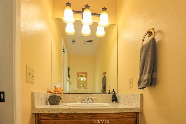 39802 Lakeview Dr Unit 12, Big Bear Lake, CA 92315 - bathroom featuring visible vents and vanity
