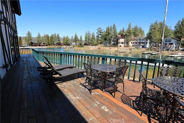 39802 Lakeview Dr Unit 12, Big Bear Lake, CA 92315 - wooden deck featuring outdoor dining area and a water view