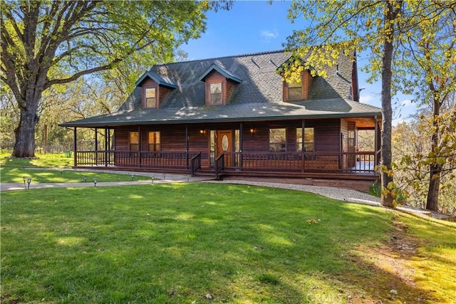 view of front of house featuring covered porch and a front lawn