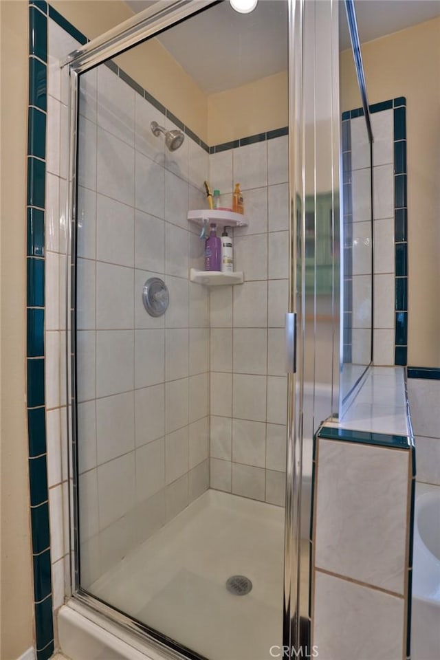 bathroom with an enclosed shower