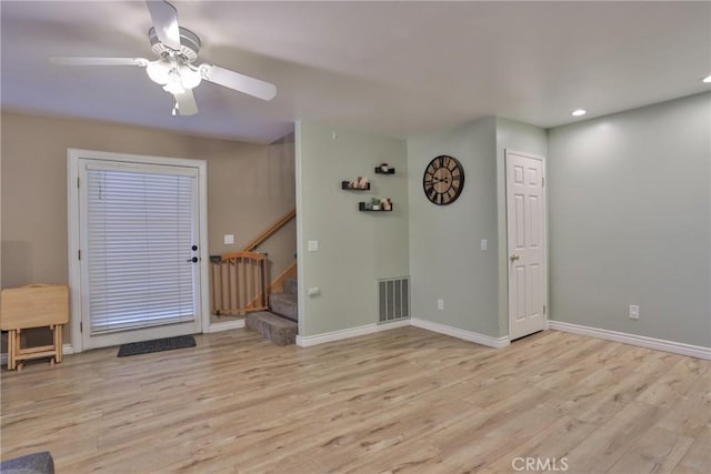 interior space featuring light hardwood / wood-style flooring and ceiling fan