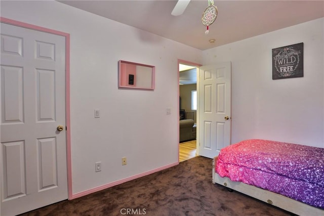 bedroom featuring carpet flooring and ceiling fan