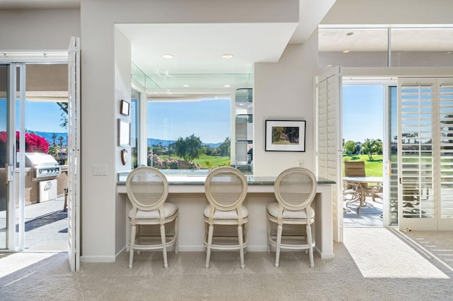 view of carpeted dining space