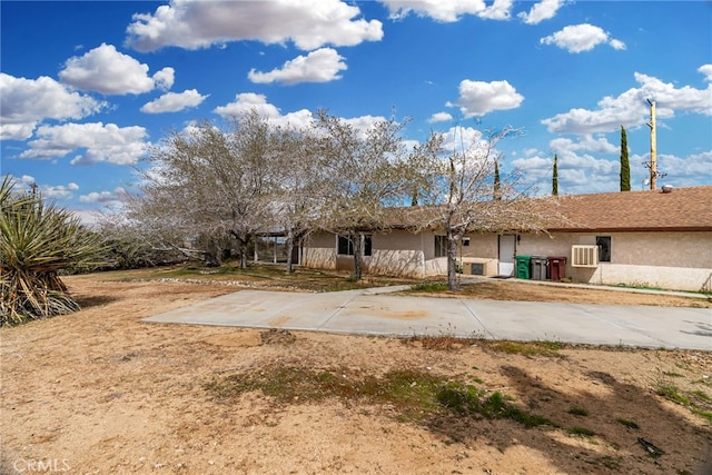 view of front of home with a patio