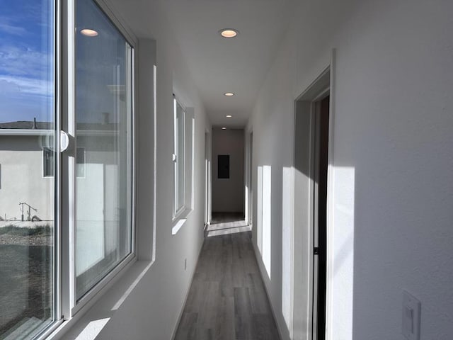 hall with dark hardwood / wood-style floors