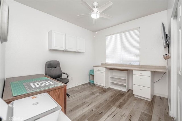 home office featuring ceiling fan and light wood-type flooring