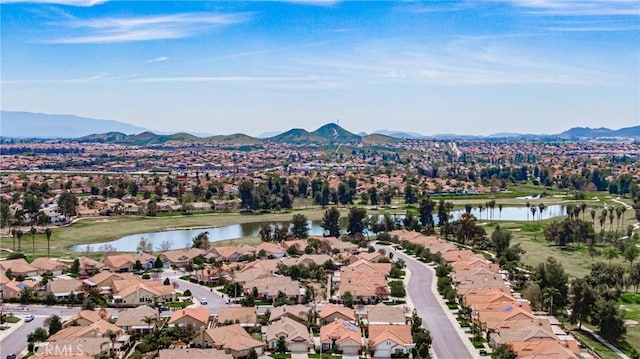 aerial view with a water and mountain view