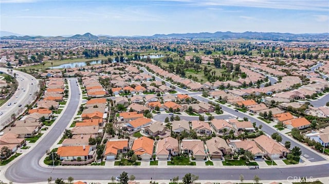 bird's eye view featuring a water and mountain view